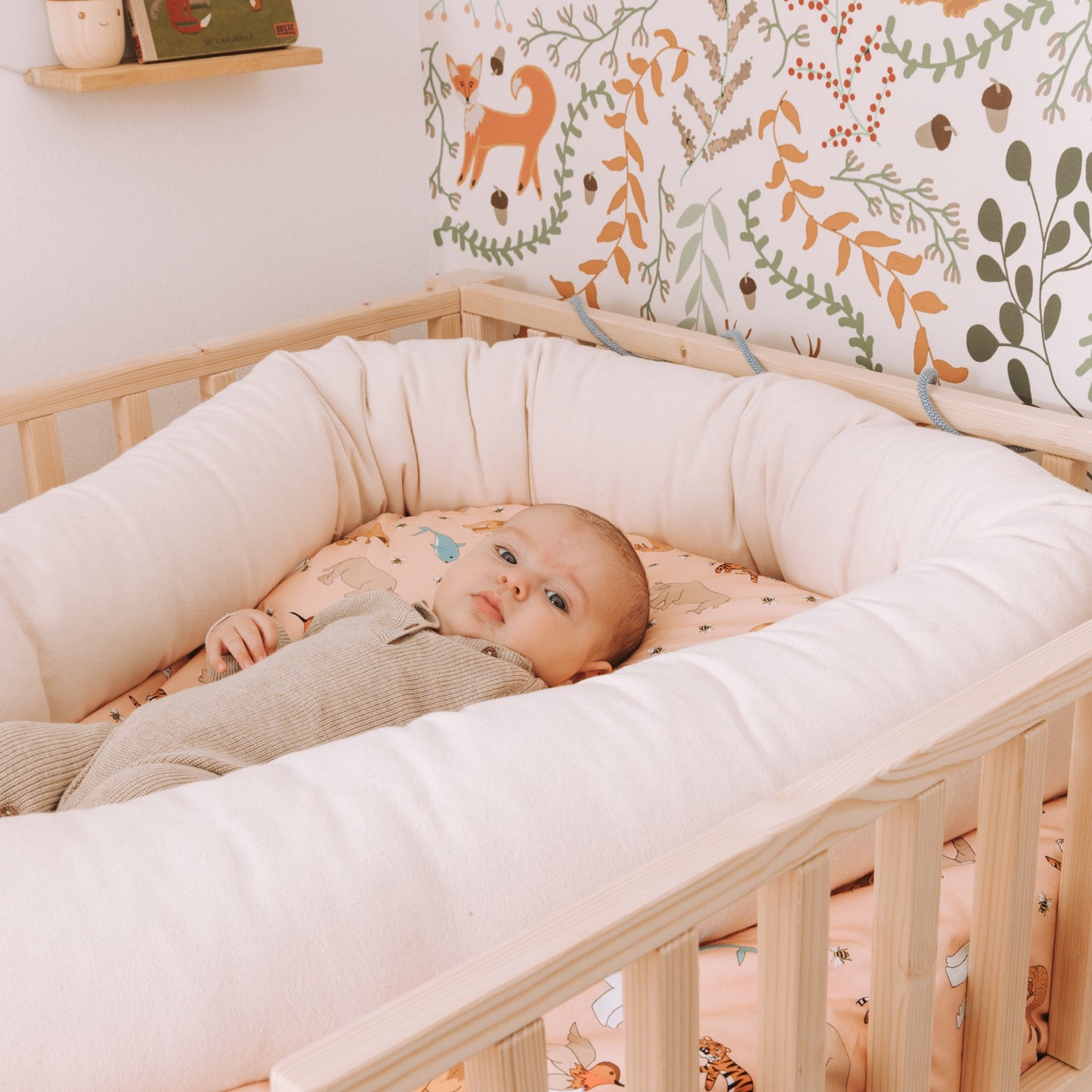 Réducteur de lit bébé